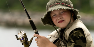 A young boy fishing