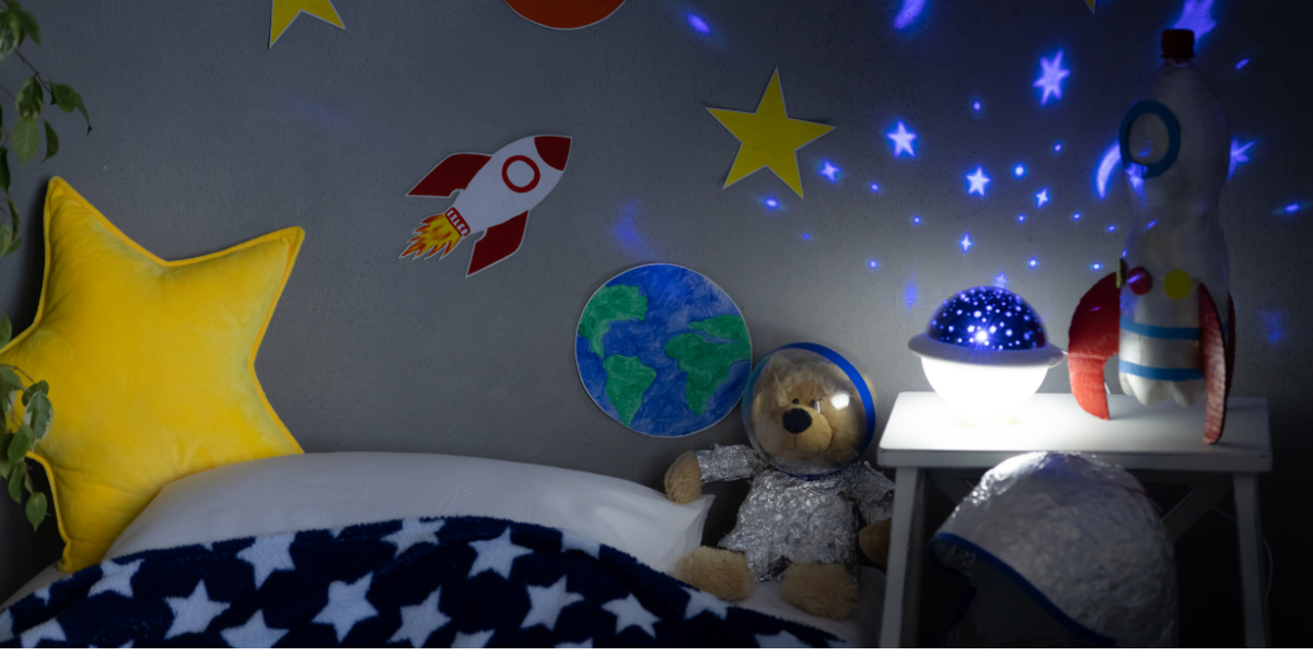 A kid's room with outer space themes