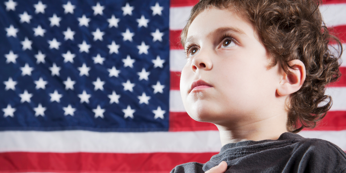 Little boy saying the pledge